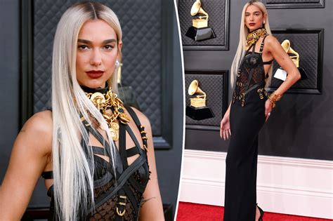 Dua Lipa Wears Versace Bondage Dress On Grammys 2022 Red Carpet