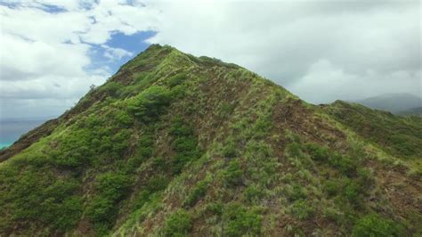 Tourists hiking the Diamond Head volcanic tuff cone in Hawaii | ClipStock