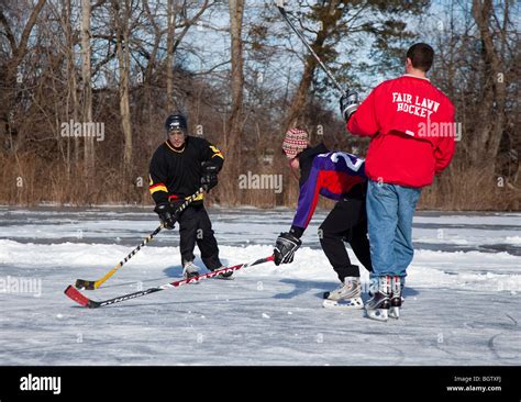 Playing Ice Hockey On A Frozen Pond Stock Photo Alamy