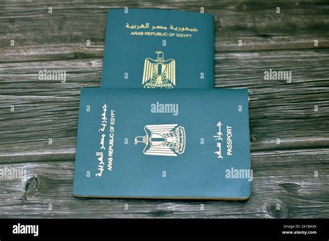 Egyptian passport isolated on wooden background, Arab republic of Egypt's passport with the ...