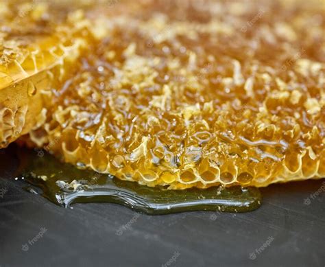 Premium Photo Closeup Honeycomb Natural Product And Gold Food For