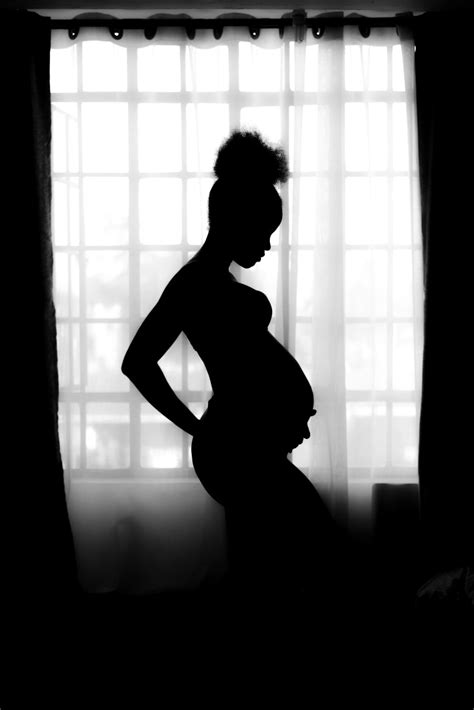 Silhouette Of Pregnant Woman Photo Free Silhouette Image On Unsplash