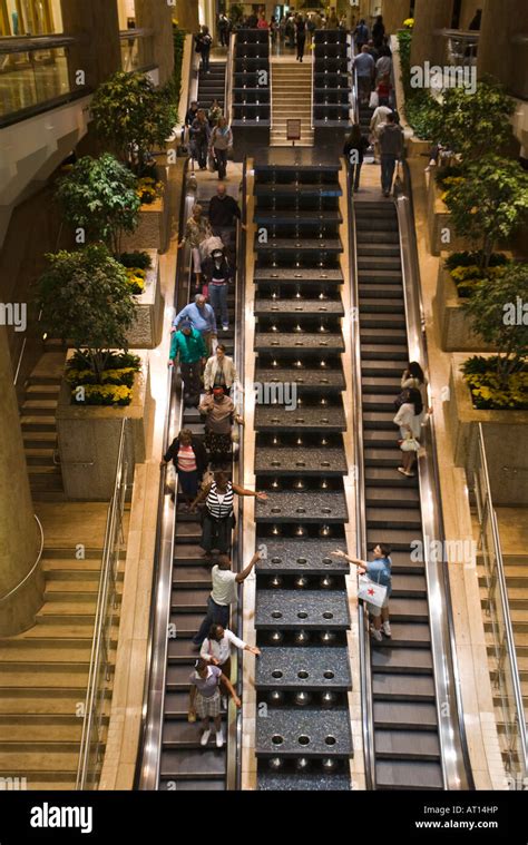 Illinois Chicago People Riding Escalators In Water Tower Place Mall