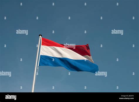 The Dutch Red And White Flag Blowing In The Wind Stock Photo Alamy