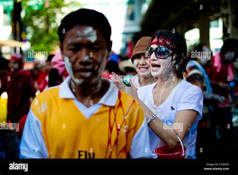 Red Shirts And Tourist Celebrates Songkran Festival At Ratchaprasong