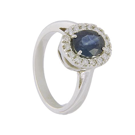 ANELLO IN ORO BIANCO CON DIAMANTI CT 0 24 E ZAFFIRI CT 1 00 MIS 11