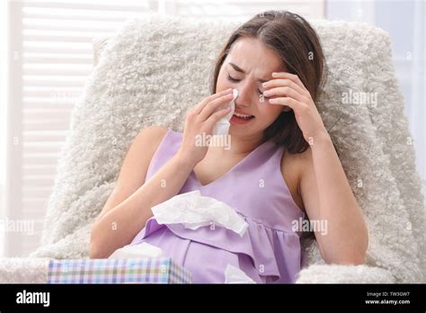 Young pregnant woman crying at home Stock Photo - Alamy