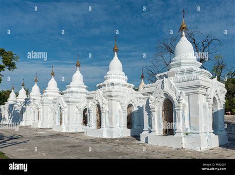 White Kyauksa Gu Cave Stupas At Kuthodaw Pagoda Mandalay Burma