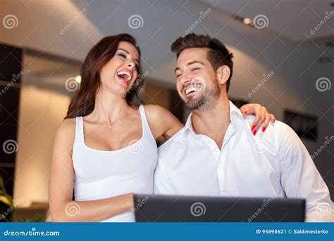 Happy Young Couple Laughing At Home Stock Image Image Of People Home