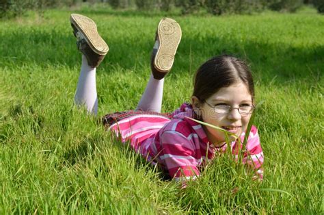 Happy Girl Lie On The Green Grass Stock Photo Image Of Holiday Face