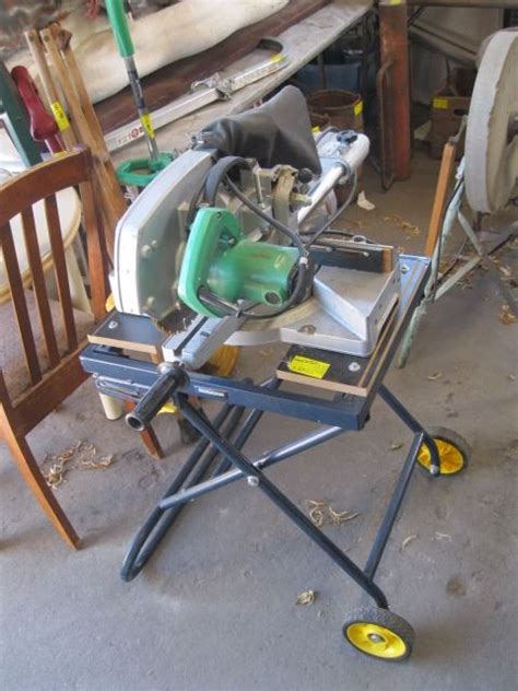 Hitachi Sliding Compound Mitre Saw On Mastercraft Stand Dodds Auction