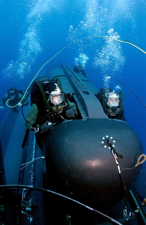 Members of SEAL Delivery Vehicle Team Two (SDVT-2) prepare to launch ...