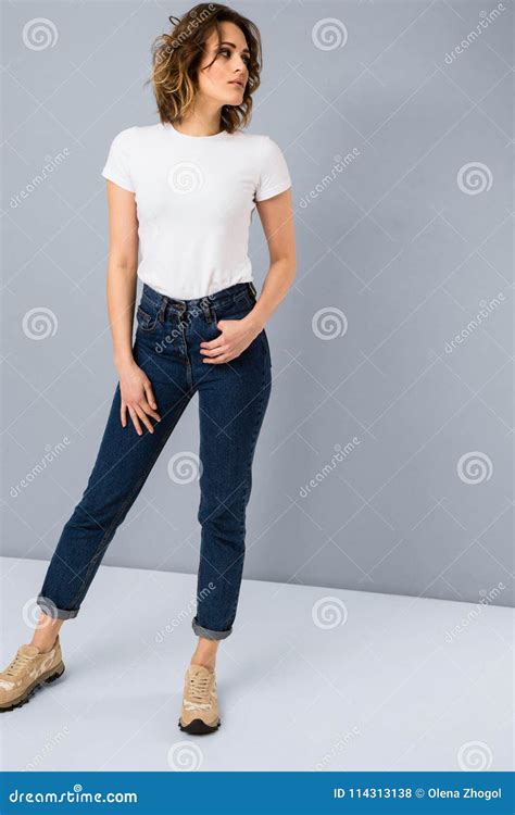 Portrait Of Stylish Young Girl In Basic White T Shirt And High Waisted