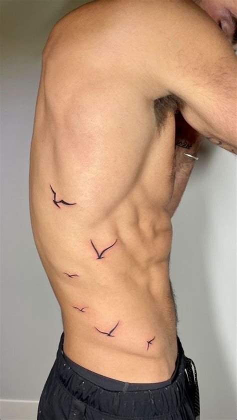 Flying High In 2022 Small Tattoos For Guys Rib Tattoos For Guys