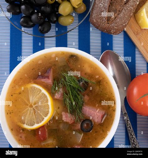 Traditional Russian Soup Solyanka Cooked With Meat Sausages Salted