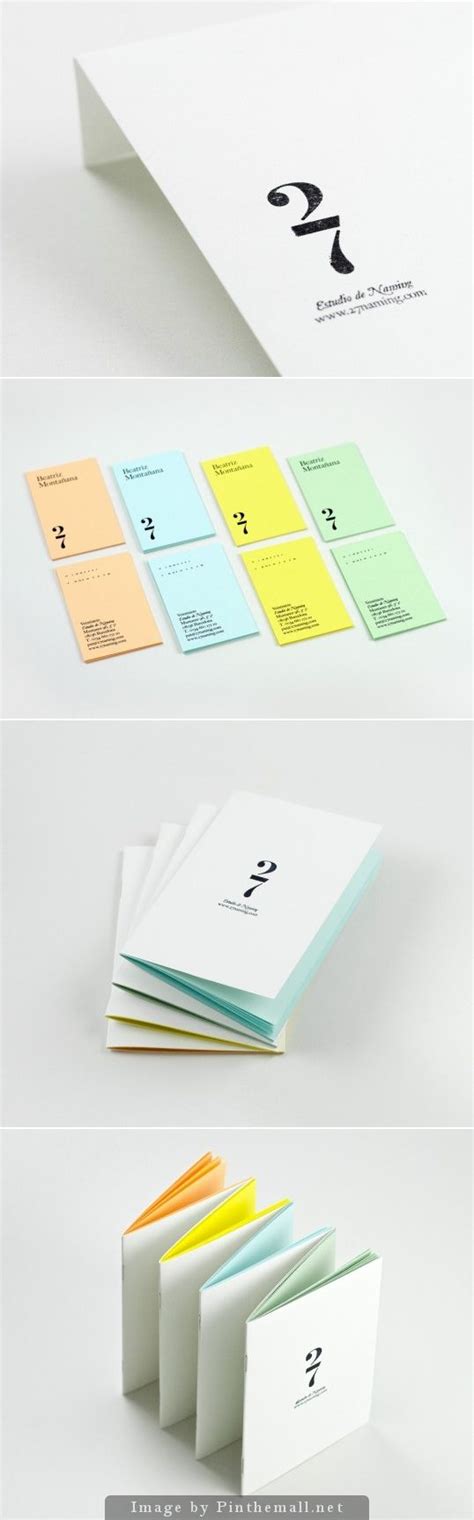 Several Different Types Of Business Cards On Top Of Each Other