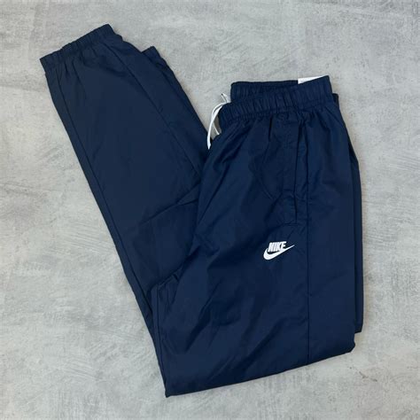 AGASALHO NIKE SPORTWEAR CLUB WOVEN AZUL MARINHO IMPERMEAVEL