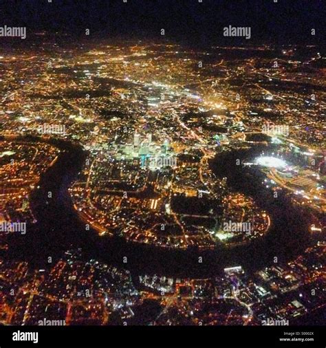 The Thames river and Central London from the air at night Stock Photo ...