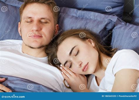 Young Cute Couple Sleeping Together In Bed Comfortable Bed And