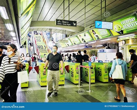 People Transportation In Bangkok Entering And Exiting The Bts