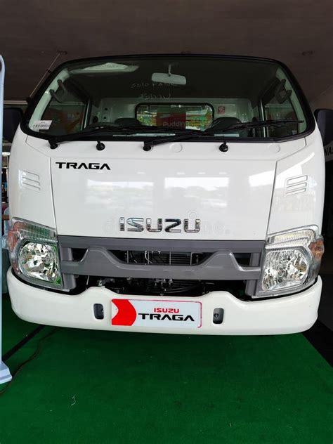 white isuzu traga pickup truck  display indonesia apr