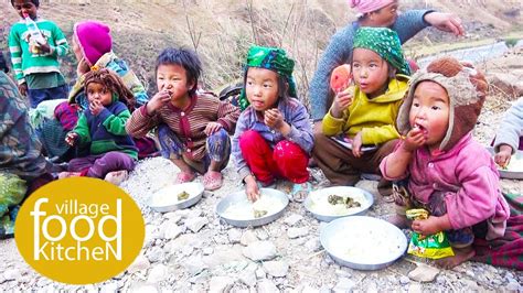 Nepali Indigenous People Eating In A Group Village Food Kitchen