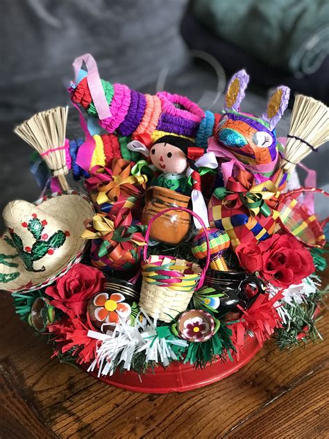 A Basket Filled With Colorful Items On Top Of A Wooden Table