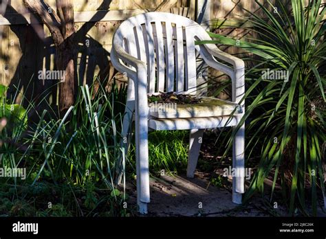 Plastic garden chairs Stock Photo - Alamy