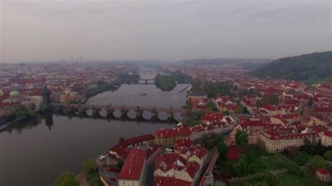 Aerial View Of Prague And Vltava River Flying Over Charles Bridge