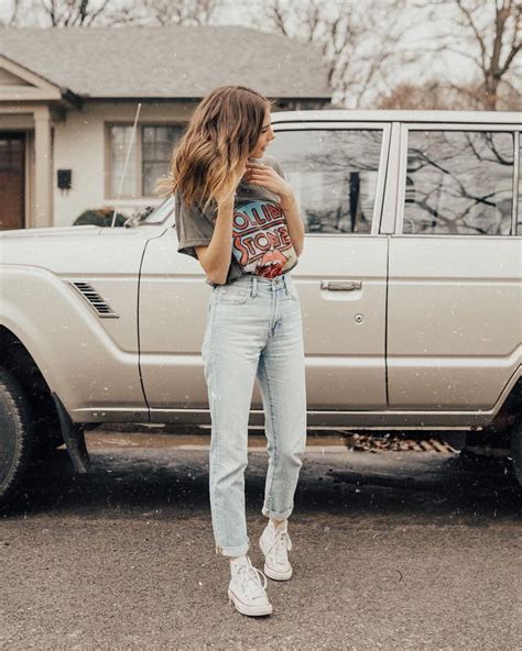 Vintage Graphic Tee Shirt With Light Wash Mom Jeans And White Sneakers Casual 150 Outfit