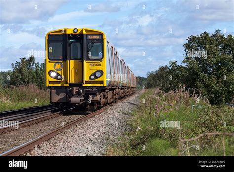 Merseyrail Electrics Class 508 Third Rail Electric Trains 508138 508126 Passing Bowkers Green