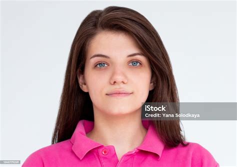 Portrait Of Young Beautiful Cute Cheerful Girl Smiling Looking At