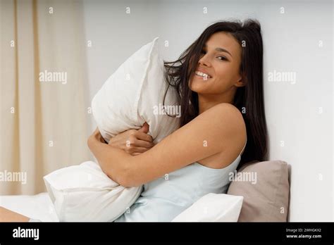 Healthy Young Woman Dressing Nightie Lying On Bed In Bedroom Stock