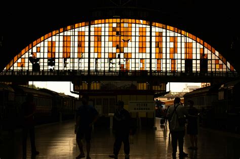 group  people standing   train station photo  hua lamphong