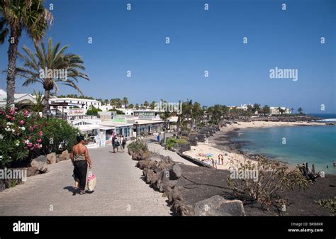 Coastal promenade at Playa Flamingo beach, Playa Blanca, Lanzarote ...