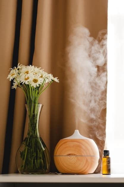 Premium Photo Aromatherapy Concept Aroma Oil Diffuser On The Table