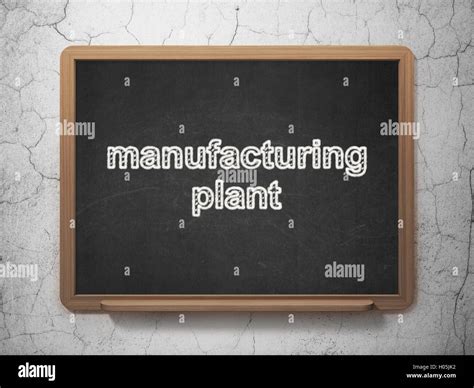 Manufacuring concept: Manufacturing Plant on chalkboard background Stock Photo - Alamy