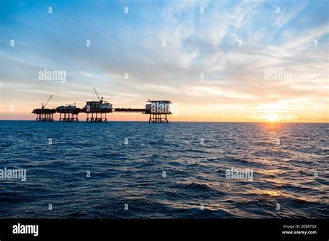 Offshore Oil Platform At Sunset Time Stock Photo Alamy