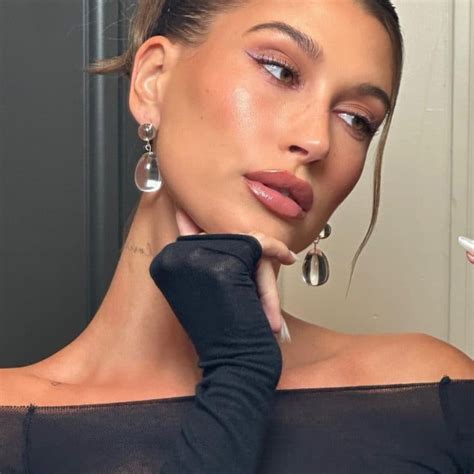 Hailey Bieber Sizzles In Skintight Black Dress And Pearls