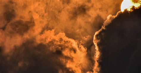 Dark Clouds Covering the Moon in the Sky · Free Stock Photo