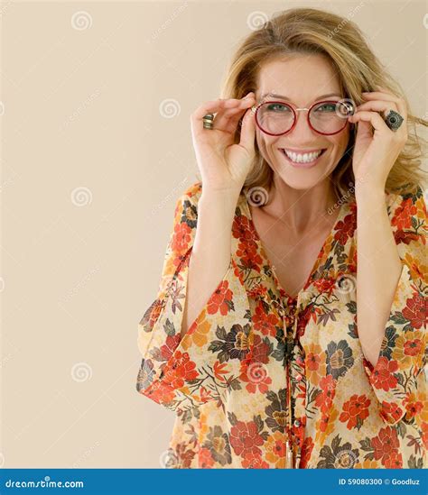 Portrait Of Attractive Mature Woman Wearing Eyeglasses Stock Photo