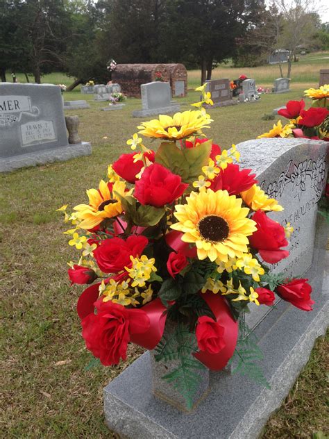 Cemetery Vase Using Red Roses Yellow Sunflowers Yellow Forsythia With