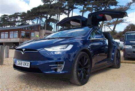 Teslas Falcon Wing Suv Has The X Factor For Electric Revolution