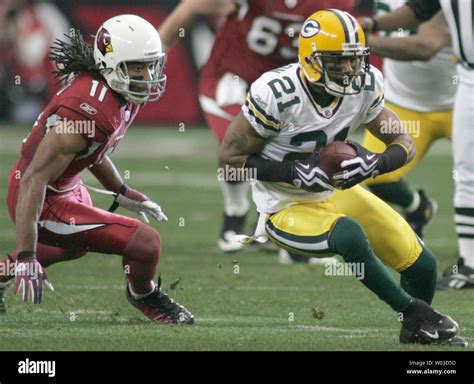 Charles woodson interception hi-res stock photography and images - Alamy