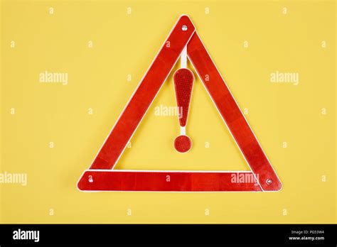 top view of warning triangle road sign isolated on yellow Stock Photo ...