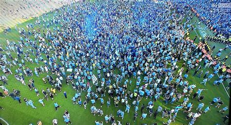 Man City fans delay trophy presentation with pitch invasion - Futbol on ...