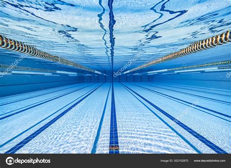 Olympic Swimming pool under water background. — Stock Photo © cookelma #302102870