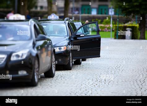 Taxi Cars On City Street Stock Photo Alamy