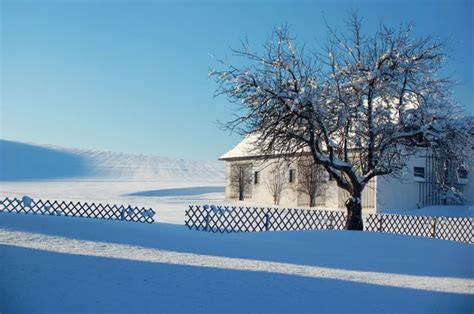 Cottage in winter landscape — Stock Photo © tepic #7552703