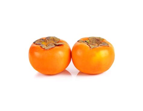 Premium Photo Fresh Ripe Persimmons Isolated On White Background